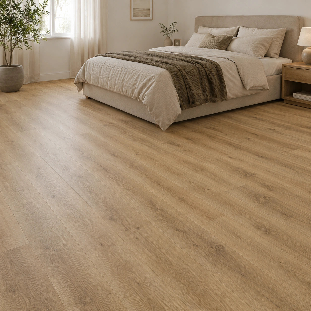 Maple Oak flooring in a bedroom with wooden bed frame