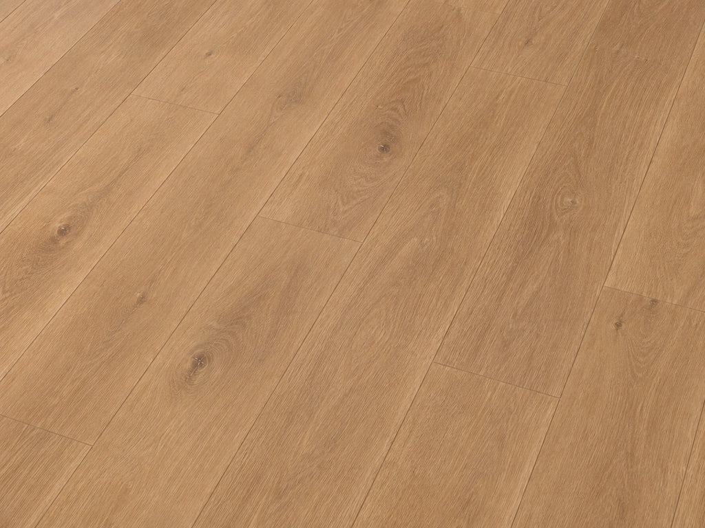 Angled detail shot of Maple Oak SPC flooring showing warm sandy-toned oak grain with natural knot detailing