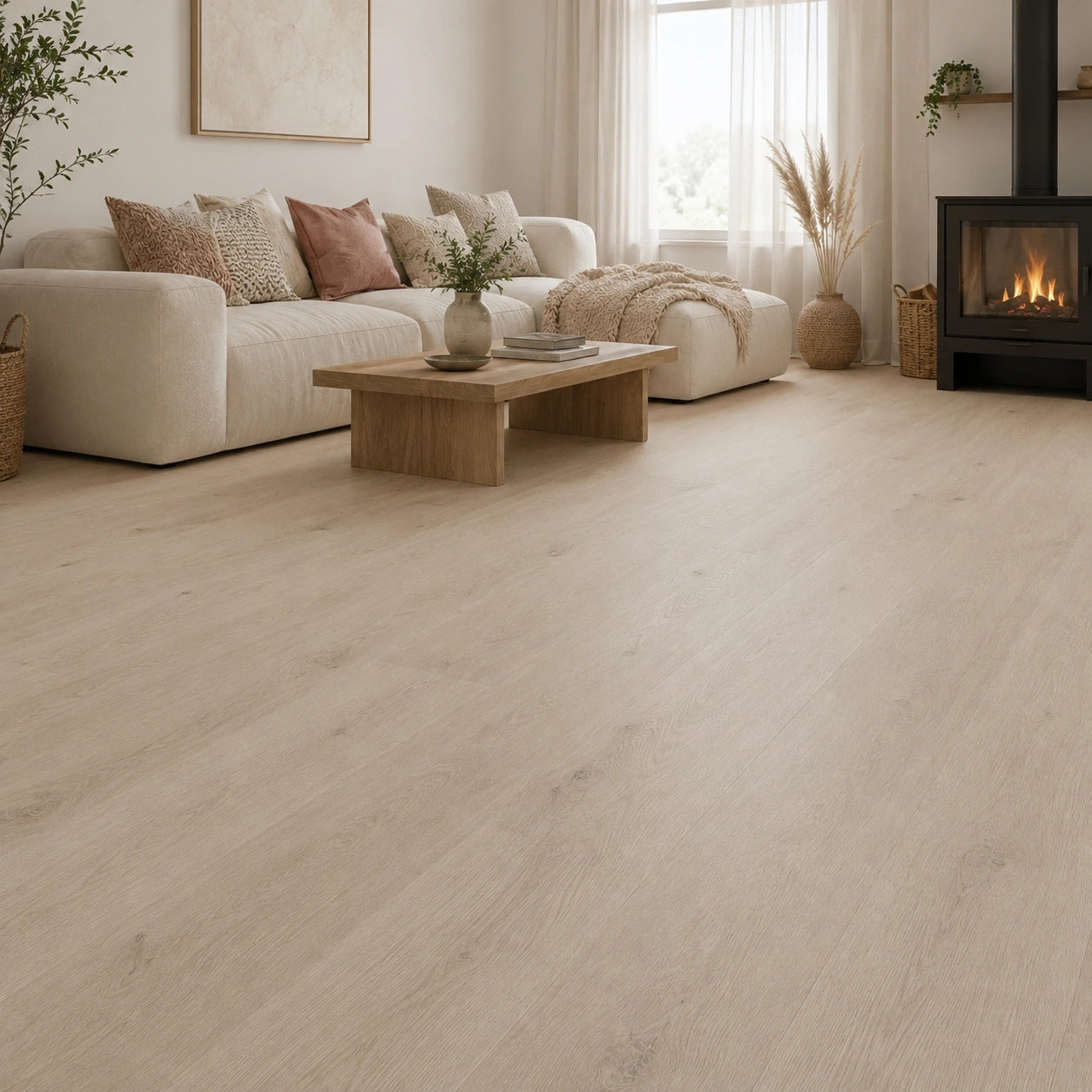 Pale oak SPC LVT flooring in a classic living room with white fireplace and grey armchair