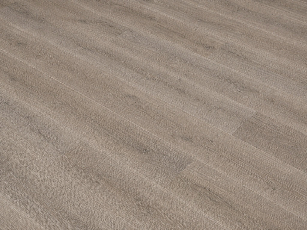 Angled detail shot of Seasoned Oak SPC flooring showing warm taupe-grey oak grain texture with fine natural wood patterning