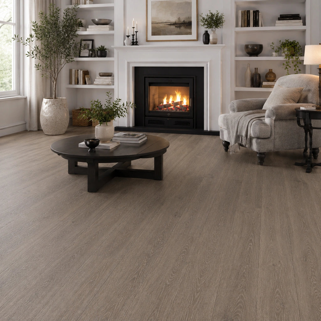 Seasoned oak SPC LVT flooring in a classic living room with white fireplace and built-in shelving