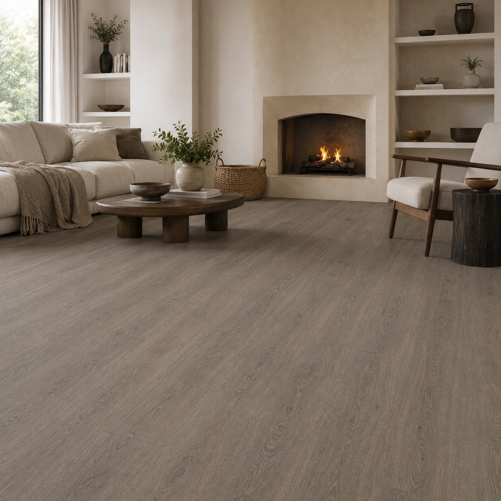 Seasoned oak SPC LVT flooring in a bright living room with wood burning stove and oak coffee table